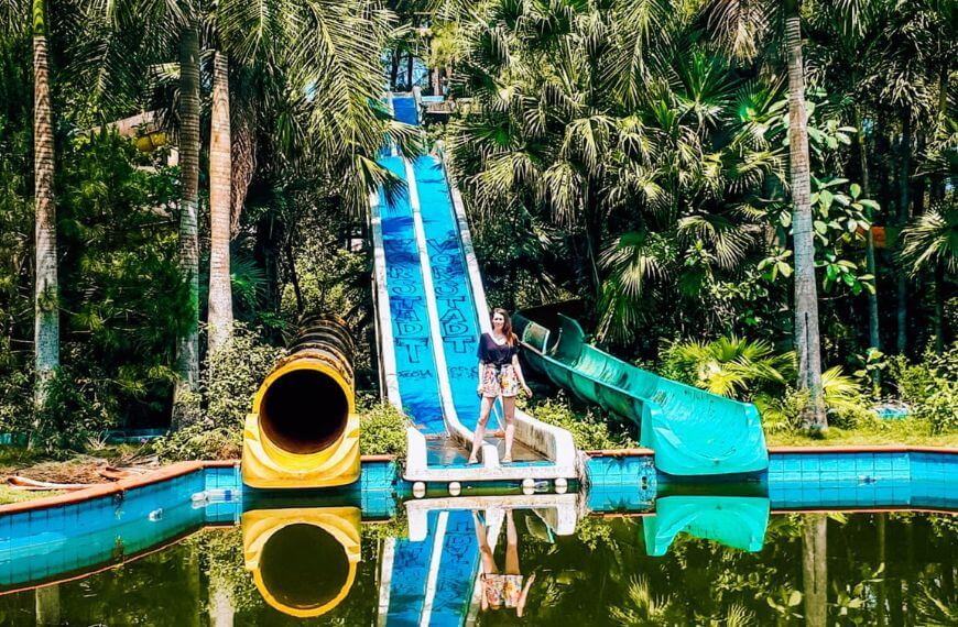 me standing on a slide at hue's abandoned waterpark