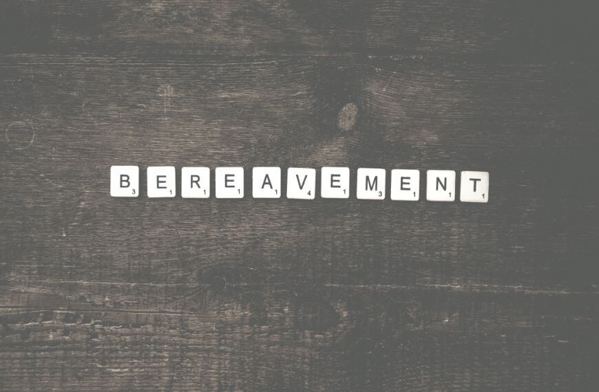 scrabble letters laid out to spell bereavement - bereavement is another reason to take a grown-up gap year