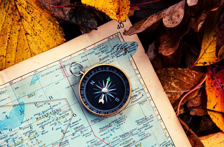compass on a map - you need both to avoid getting lost which is one of the dangers of hiking
