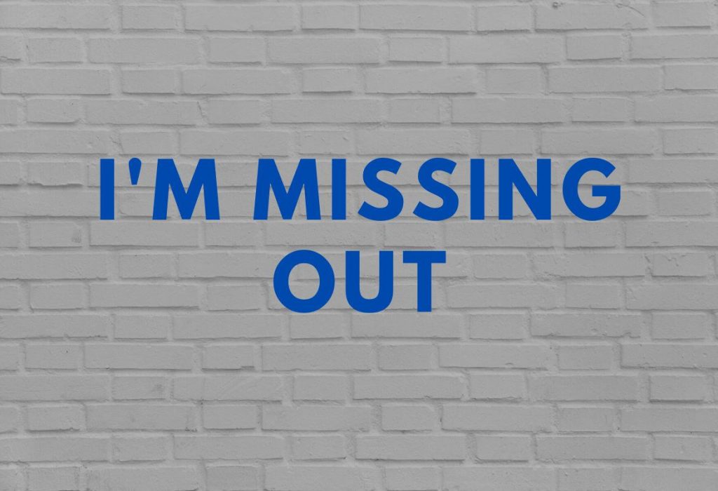 wall painted with the words "I'm missing out"