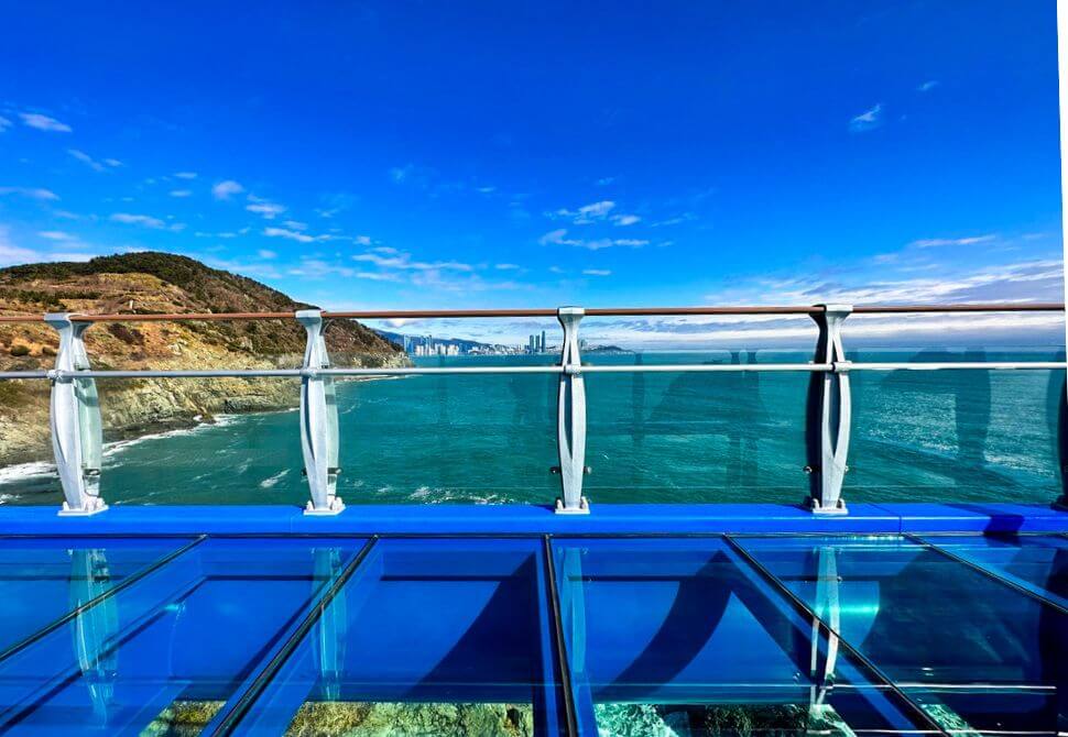 Walking along the Oryukdo skywalk glass platform