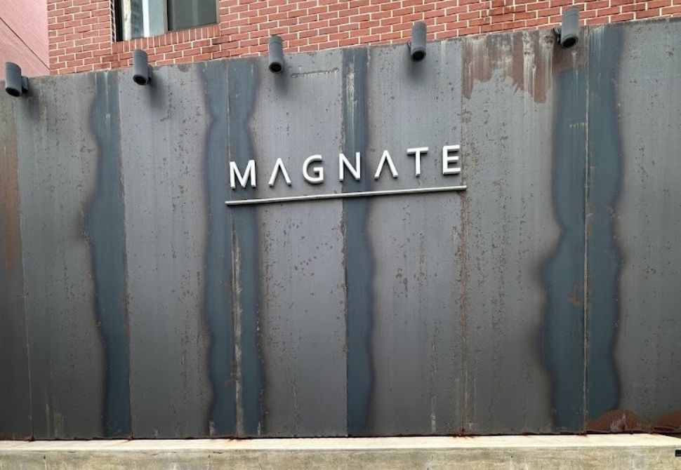 Magnate cafe back yard wall seating area - one of the popular cafe locations in Korea for ARMY and BTS fans