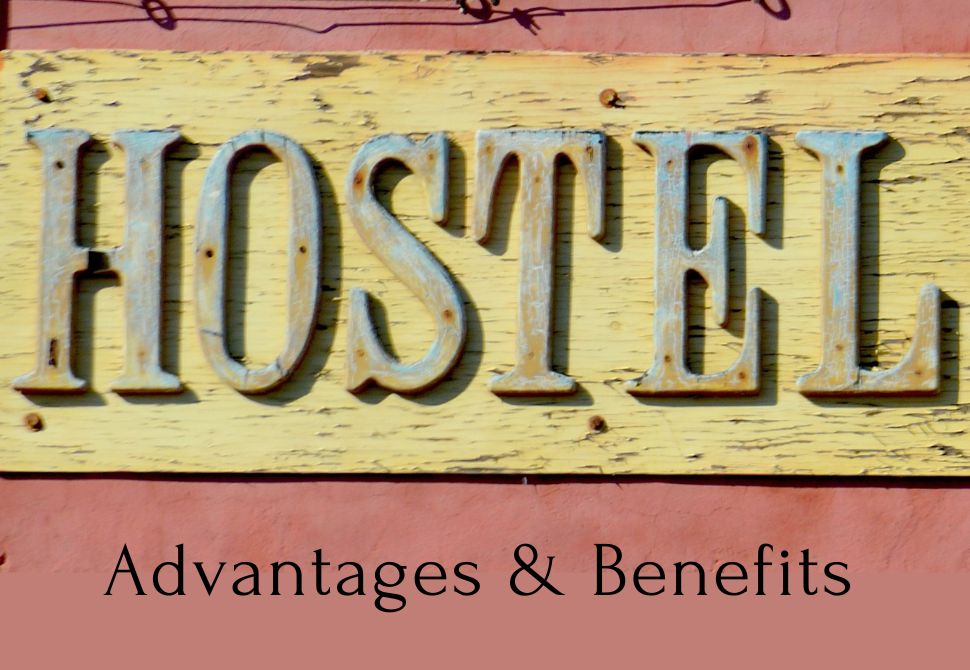 a wooden "hostel" sign on a wall with graphic text underneath with the title of the post "advantages of a hostel"